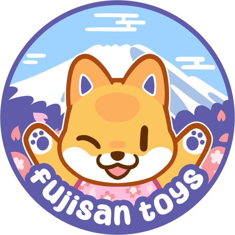 FujisanToys Logo A cute dog character with a winking face, set against a mountainous backdrop.